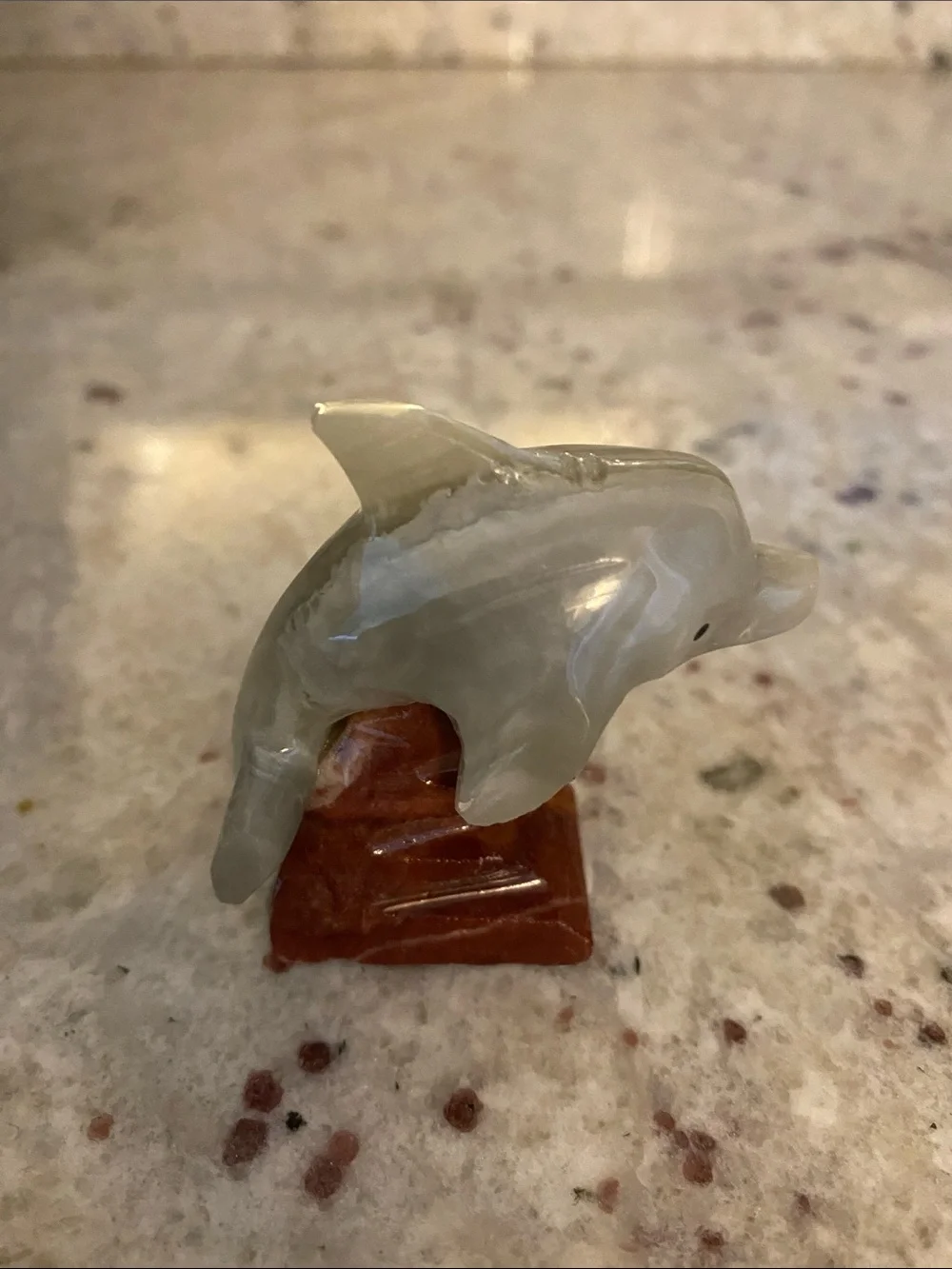 Stone dolphin figure. NWT about 1.5x2.5 in. Summer